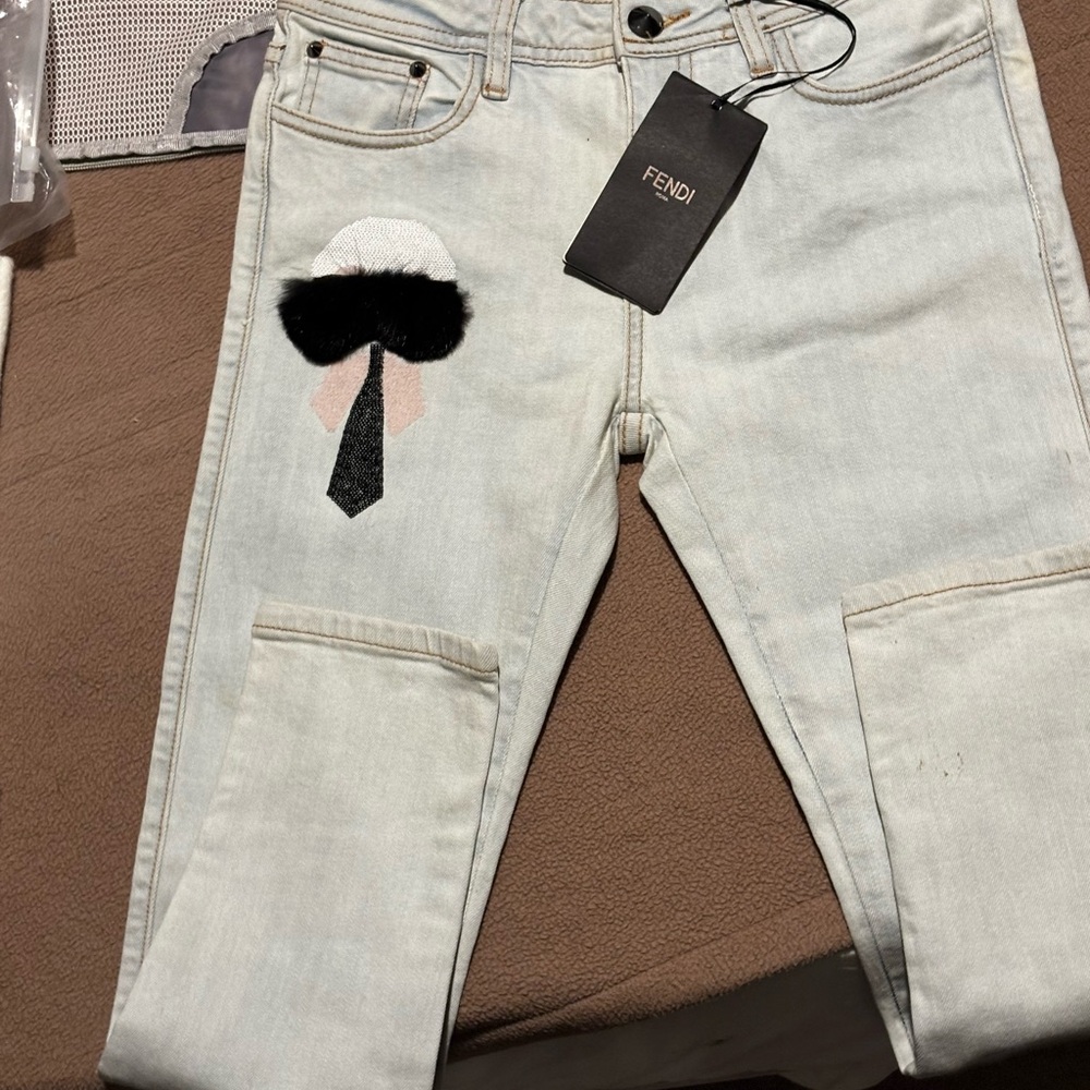 Fendi Men's Light Blue Jeans with Black and White Patch